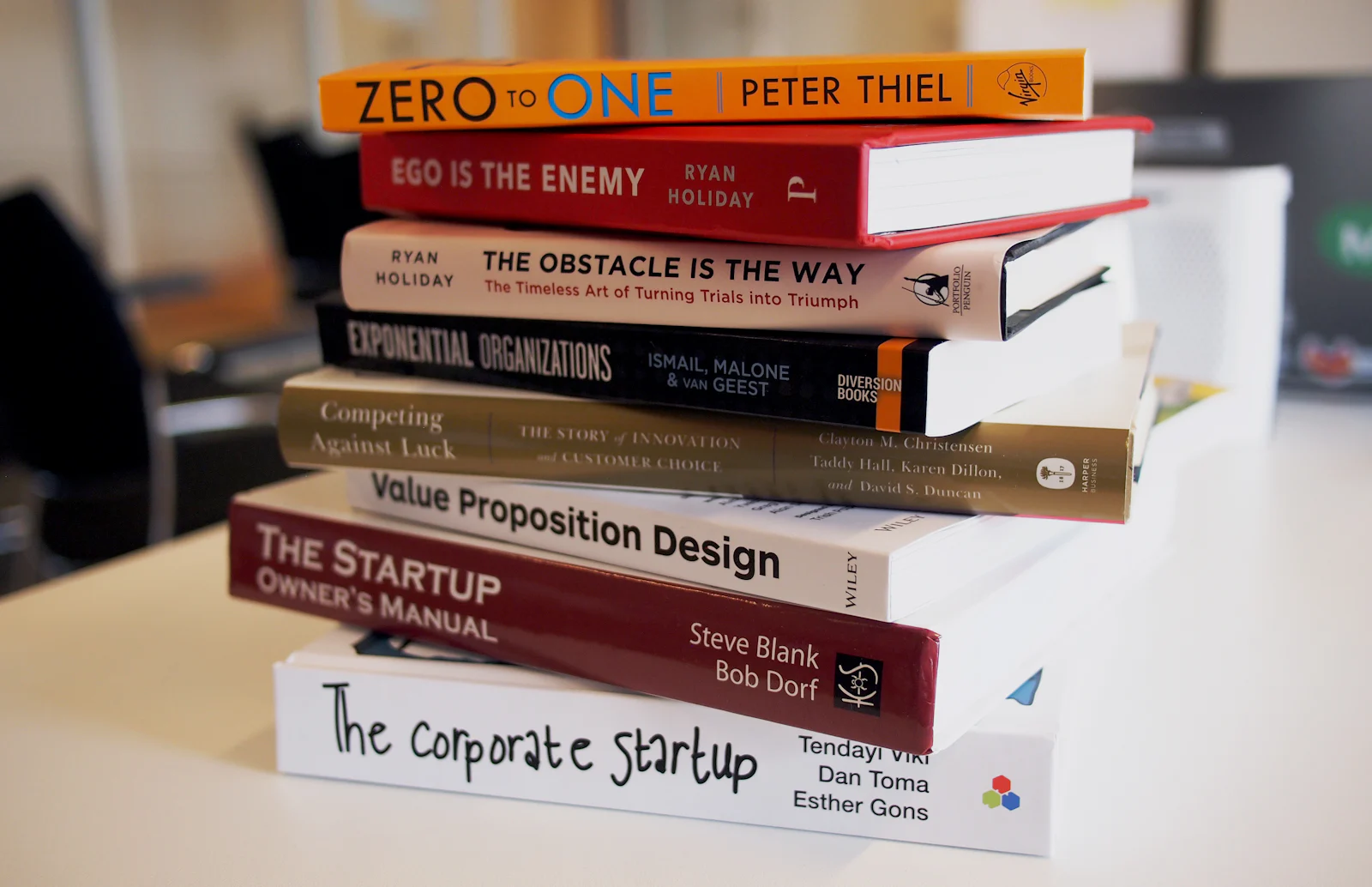 A stack of printed business books