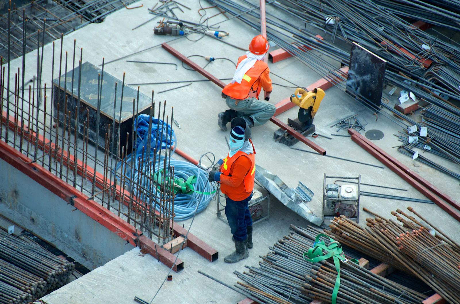 Workers in hard hats on an active construction site