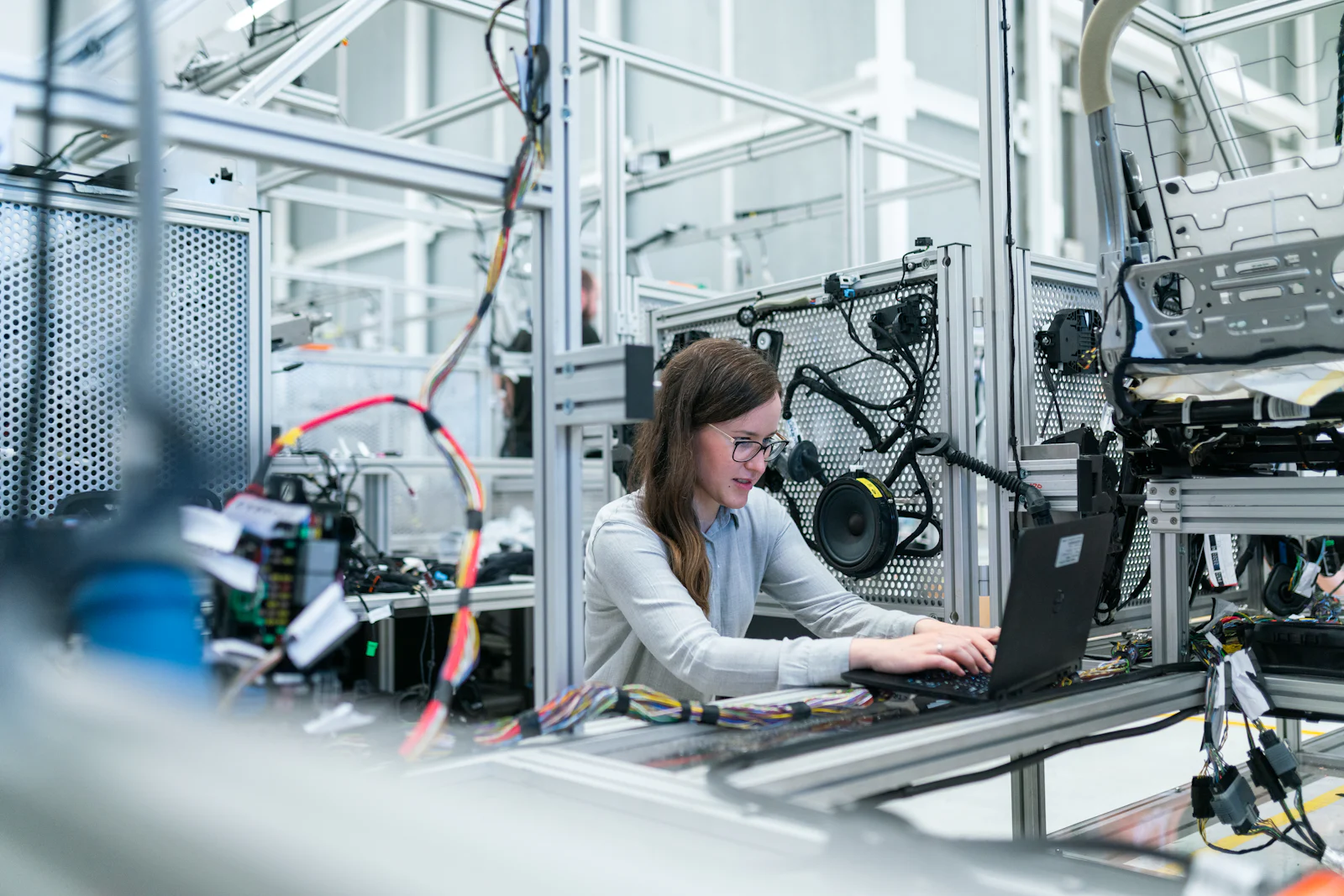 Technician working at an industrial control station