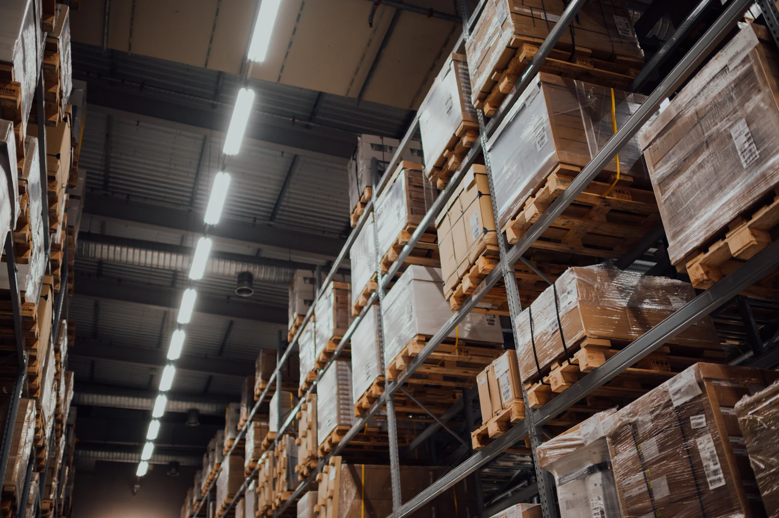 Warehouse shelving stocked with boxed goods